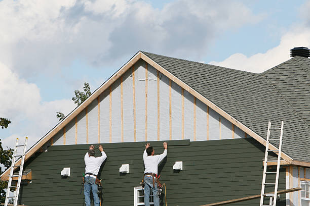 Professional Emergency Siding Repair technician working in Montpelier, OH